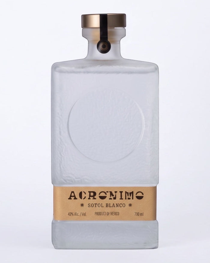 Licomar, Vinos y Licores frosted glass bottle of Acronimo Sotol Blanco 700ml with gold cap and label.