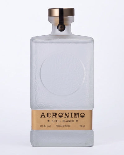 Licomar, Vinos y Licores frosted glass bottle of Acronimo Sotol Blanco 700ml with gold cap and label.